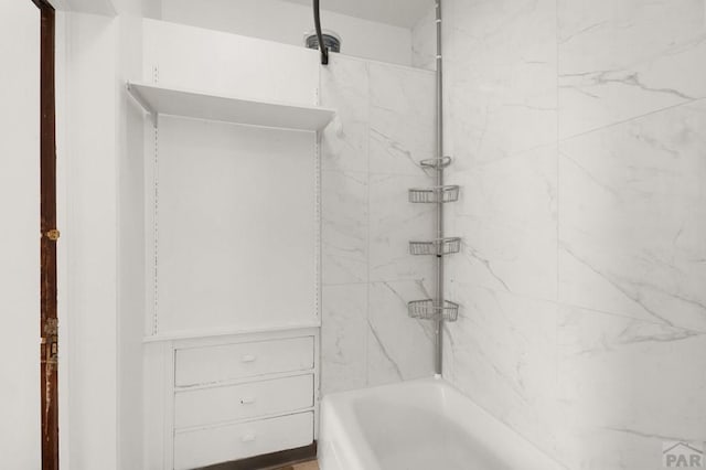 full bath featuring tub / shower combination