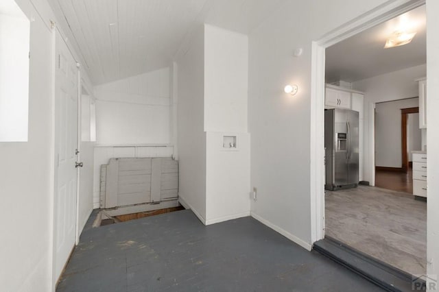interior space featuring lofted ceiling