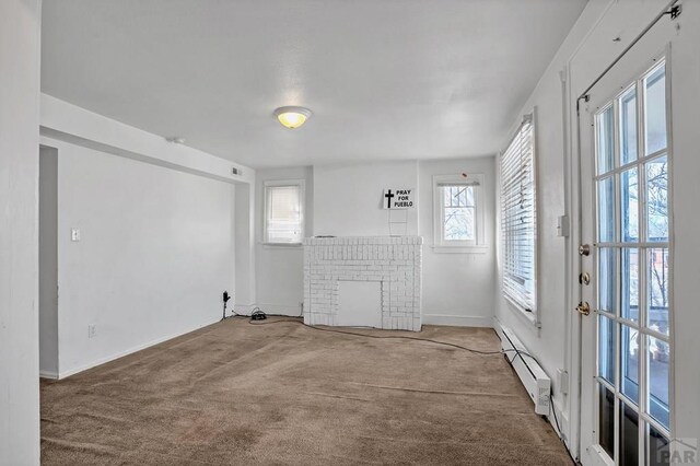 kitchen featuring visible vents, electric stove, light countertops, black microwave, and light tile patterned flooring