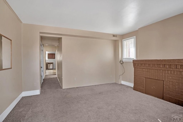 1110-112 E 6th St, Pueblo, CO 81001 - carpeted spare room with visible vents and baseboards