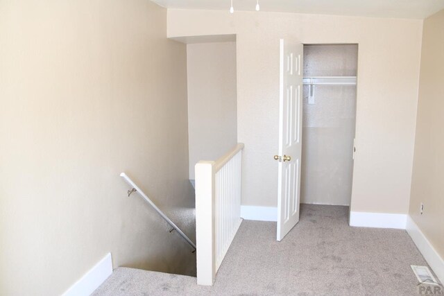 kitchen with visible vents, electric range oven, stainless steel microwave, and light tile patterned flooring