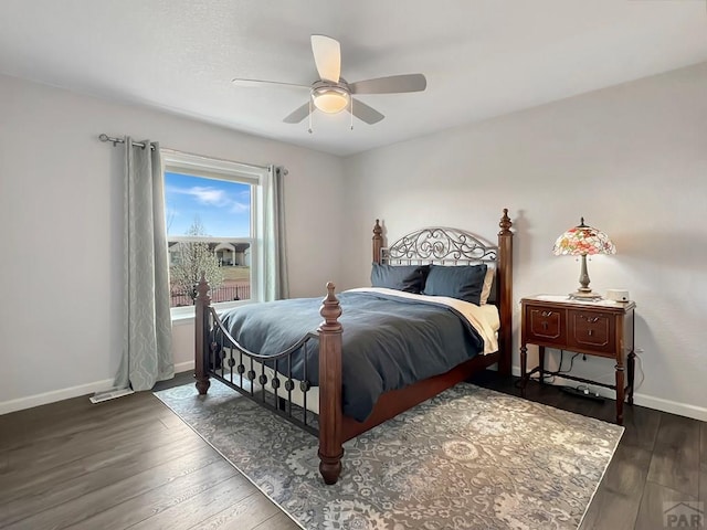 439 N Mitford Dr, Pueblo West, CO 81007 - bedroom featuring hardwood / wood-style floors, baseboards, and a ceiling fan