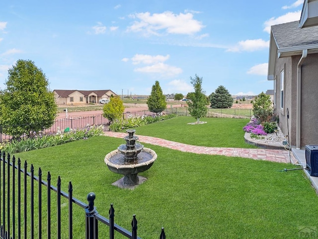 439 N Mitford Dr, Pueblo West, CO 81007 - view of yard with central AC unit