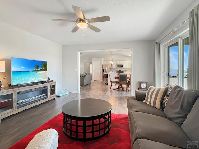 439 N Mitford Dr, Pueblo West, CO 81007 - living area featuring wood finished floors and ceiling fan