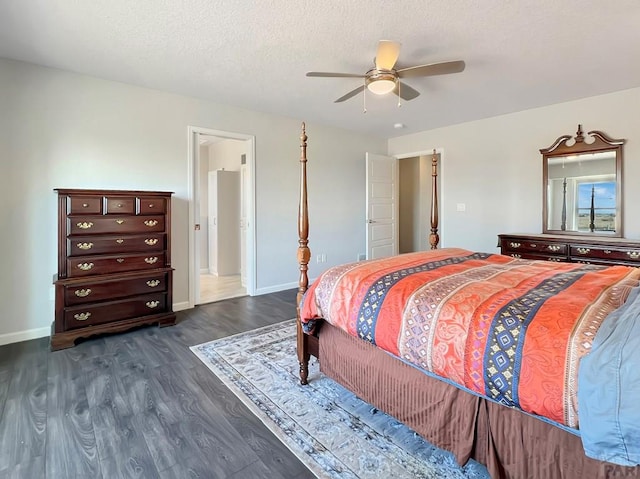 439 N Mitford Dr, Pueblo West, CO 81007 - bedroom with dark wood finished floors, baseboards, and a ceiling fan
