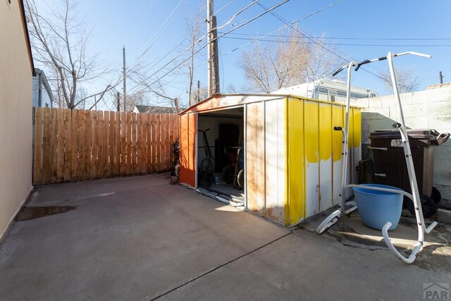 view of shed featuring a fenced backyard