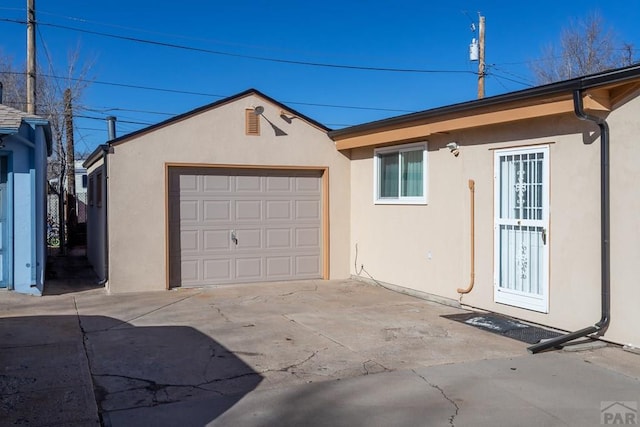 garage with driveway