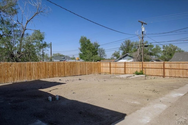 view of yard featuring a fenced backyard