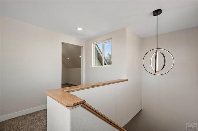 hallway featuring recessed lighting, an upstairs landing, baseboards, carpet flooring, and a notable chandelier