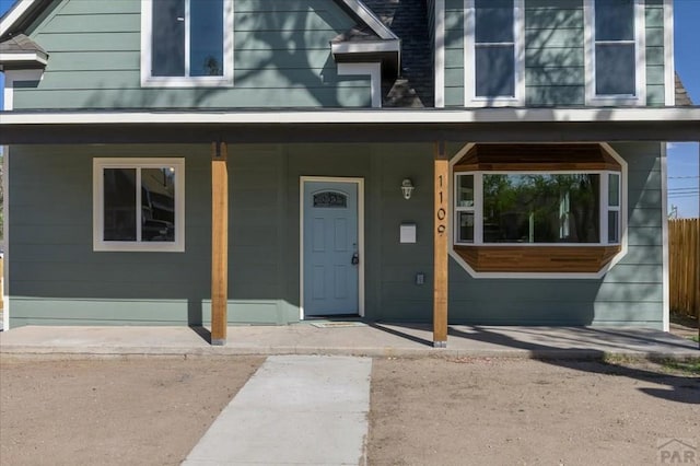 entrance to property with a porch