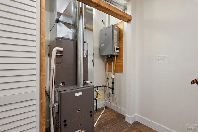utilities featuring water heater and heating unit