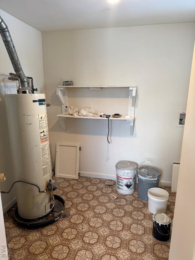 utility room with water heater