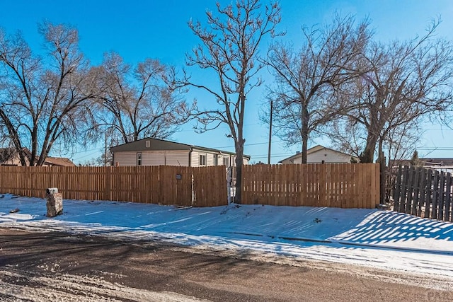 view of pool featuring fence