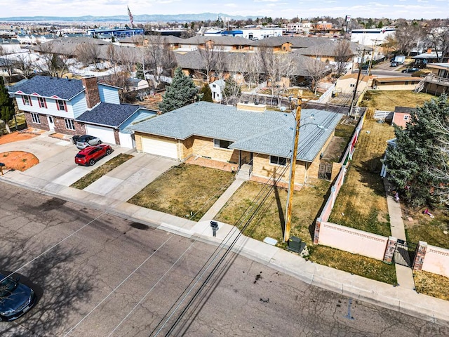 birds eye view of property with a residential view