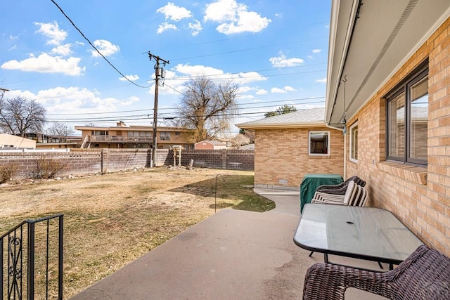 view of patio with a fenced backyard