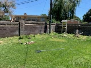 view of yard with fence