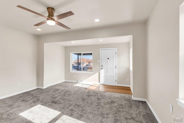 carpeted empty room with ceiling fan, recessed lighting, and baseboards