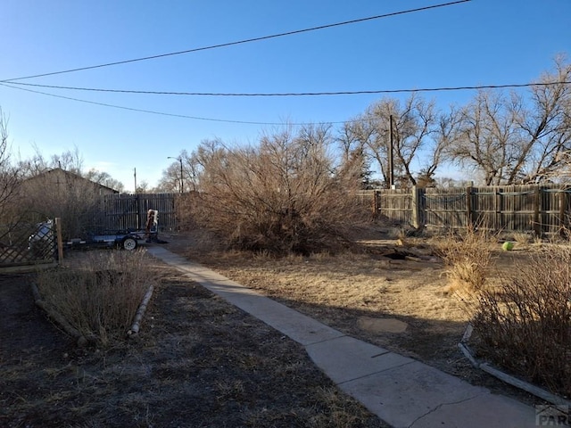 view of yard with fence