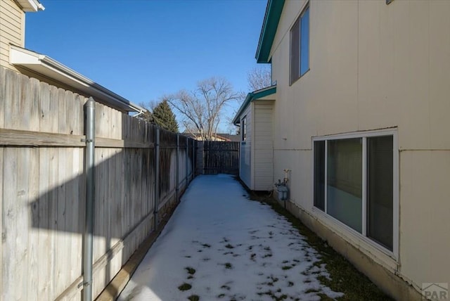 view of side of property with a fenced backyard