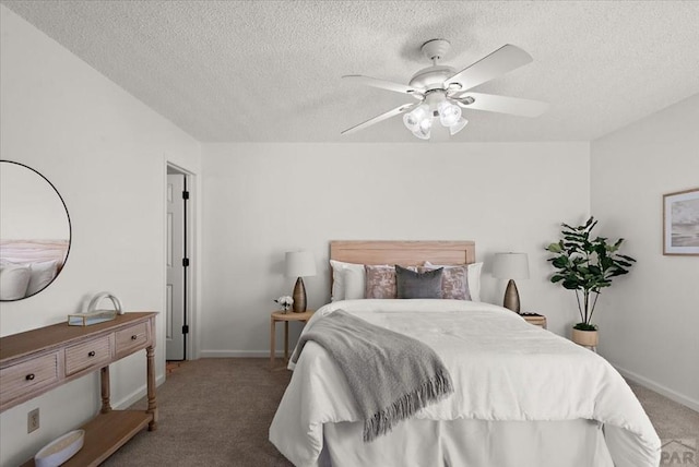 139 Princeton St, Pueblo, CO 81005 - bedroom featuring baseboards, a textured ceiling, dark carpet, and a ceiling fan