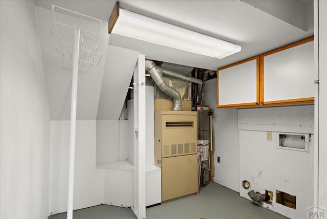 utility room with gas water heater