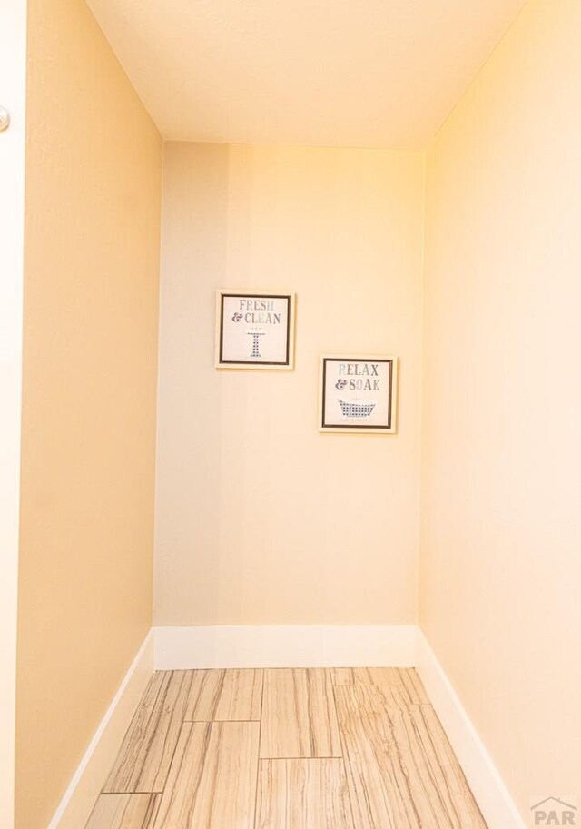 empty room with baseboards