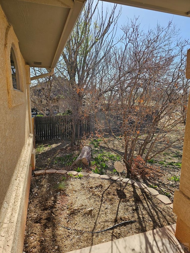 view of yard with fence