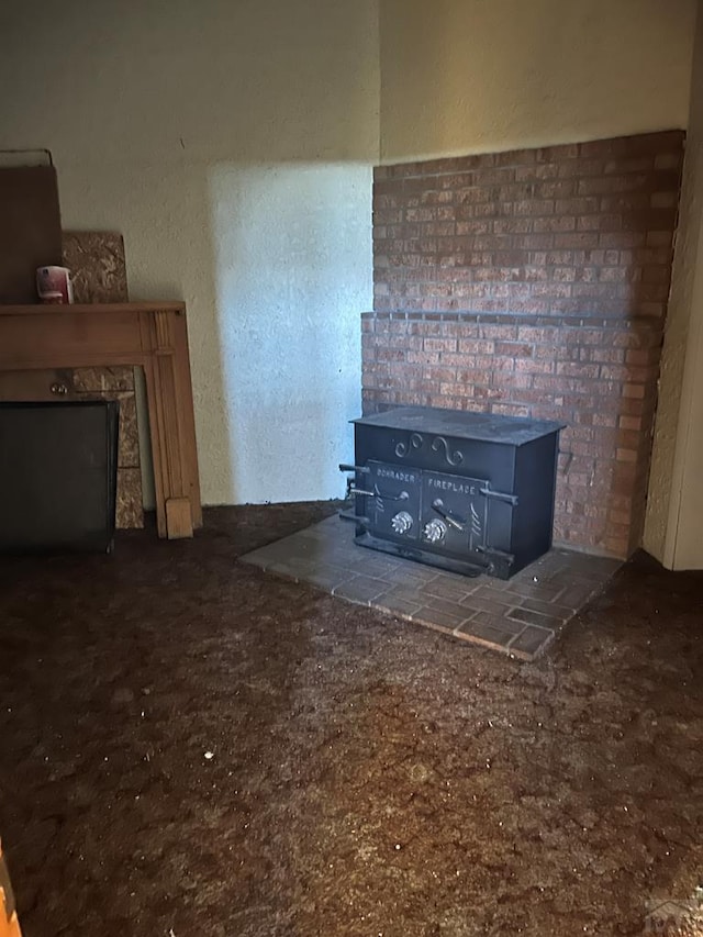 unfurnished living room with a fireplace