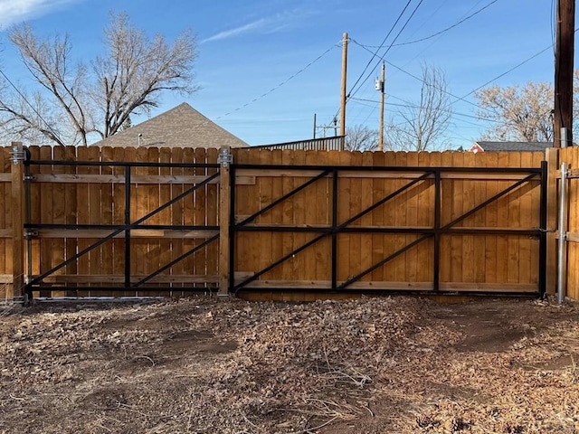 110 W 10th St, Walsenburg, CO 81089 - view of gate with fence