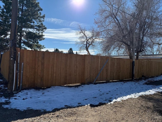 110 W 10th St, Walsenburg, CO 81089 - yard covered in snow featuring fence