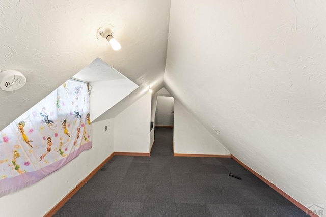 616 E 5th St, Pueblo, CO 81001 - bonus room with carpet flooring, baseboards, and vaulted ceiling