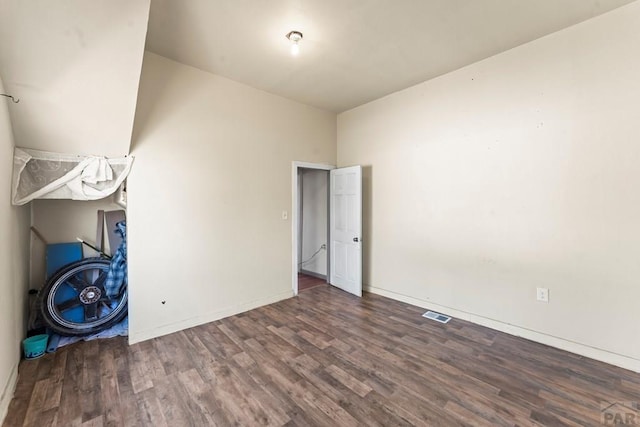 616 E 5th St, Pueblo, CO 81001 - spare room featuring baseboards, wood finished floors, and visible vents