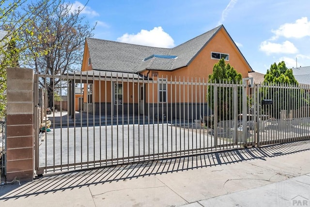 616 E 5th St, Pueblo, CO 81001 - view of gate featuring a fenced front yard