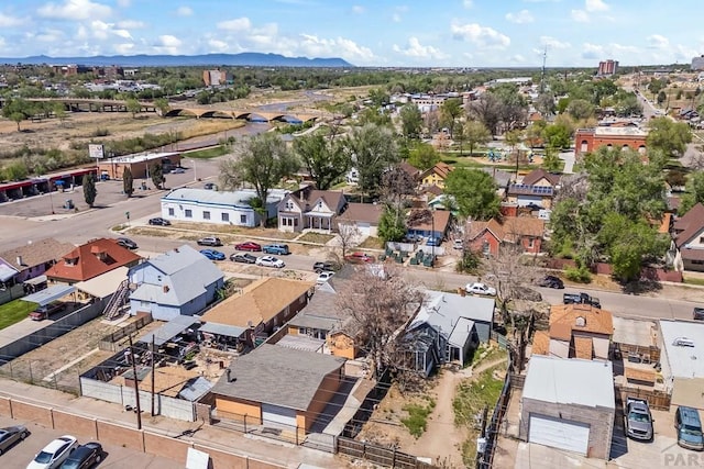 616 E 5th St, Pueblo, CO 81001 - drone / aerial view with a mountain view and a residential view