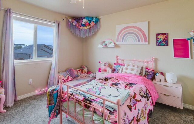 bedroom with carpet floors, ceiling fan, and baseboards