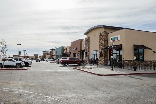 exterior space featuring uncovered parking