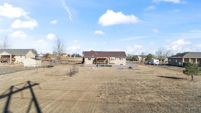 view of yard featuring a residential view and fence