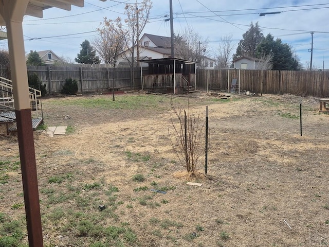 view of yard featuring a fenced backyard