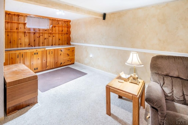 1329 Alexander Cir, Pueblo, CO 81001 - sitting room with beamed ceiling and carpet floors