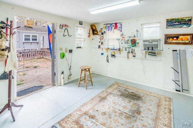 1329 Alexander Cir, Pueblo, CO 81001 - garage featuring cooling unit and baseboards