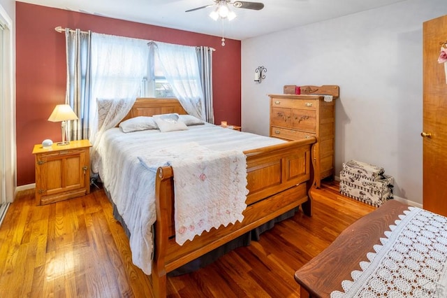 1329 Alexander Cir, Pueblo, CO 81001 - bedroom with wood finished floors and ceiling fan