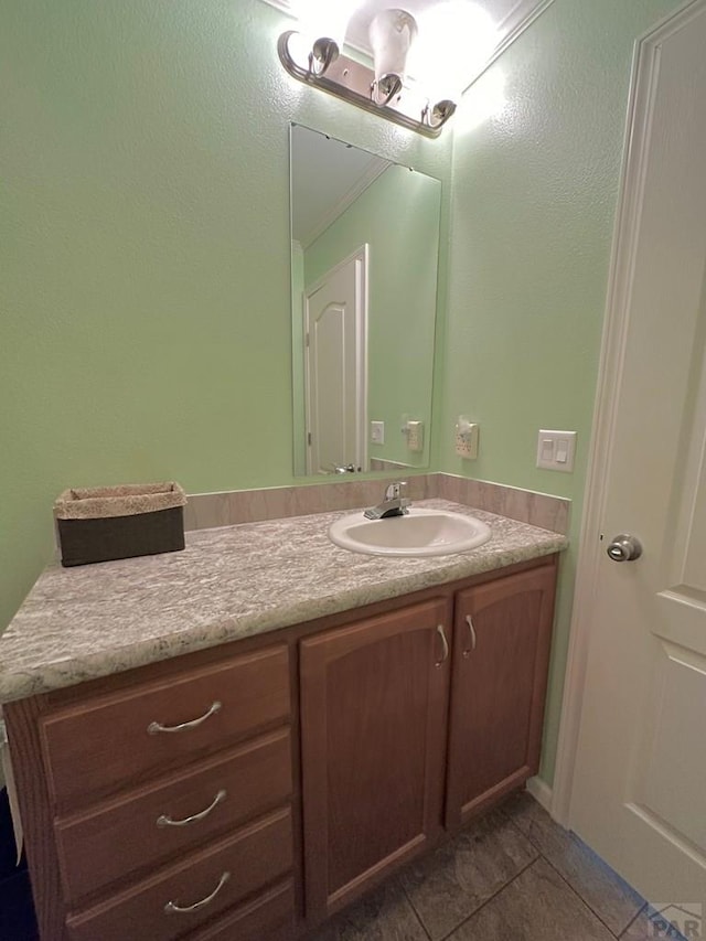 15406 County Rd E.25, Ordway, CO 81063 - bathroom with vanity and tile patterned flooring