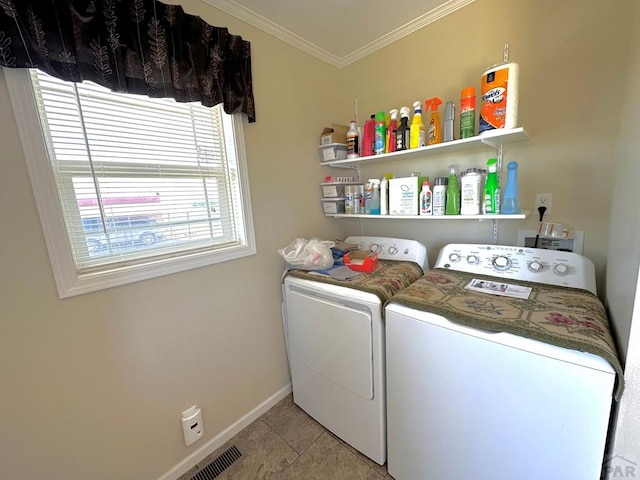 15406 County Rd E.25, Ordway, CO 81063 - laundry area with washer and dryer, crown molding, and tile patterned flooring