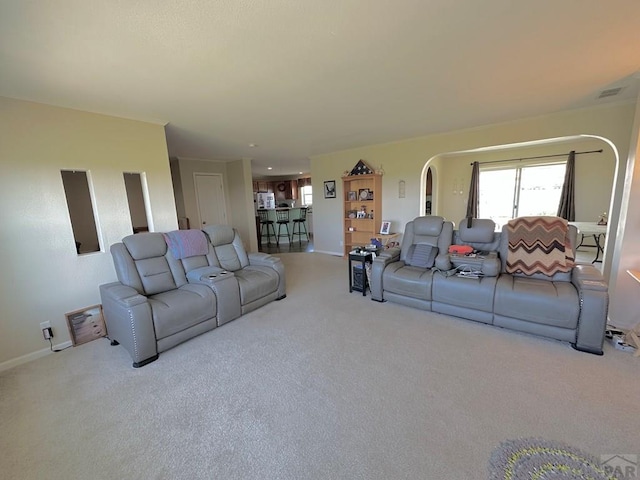 15406 County Rd E.25, Ordway, CO 81063 - living area with carpet and arched walkways