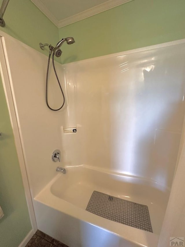 15406 County Rd E.25, Ordway, CO 81063 - full bathroom featuring crown molding and bathing tub / shower combination