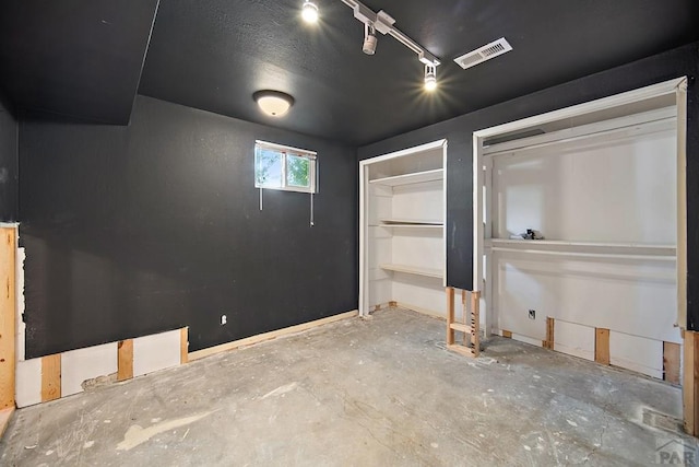 130 Montcalm Dr, Pueblo, CO 81005 - unfurnished bedroom with concrete flooring and baseboards