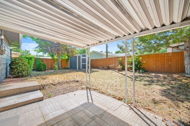 130 Montcalm Dr, Pueblo, CO 81005 - fenced backyard with a patio area and a shed