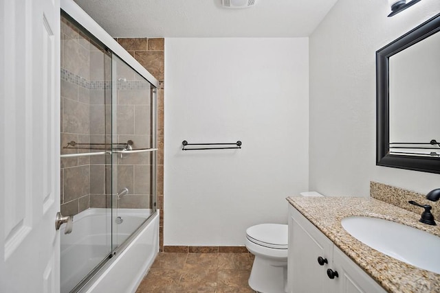 130 Montcalm Dr, Pueblo, CO 81005 - full bath with vanity and shower / bath combination with glass door