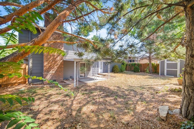 130 Montcalm Dr, Pueblo, CO 81005 - fenced backyard featuring a shed and a patio