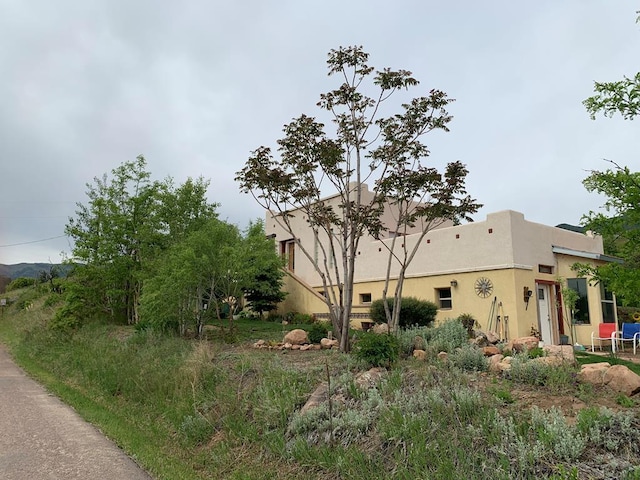 2075 County Rd 389th Rd, Wetmore, CO 81253 - view of side of property featuring stucco siding